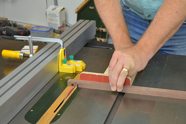 Cross-cut sled with sandpaper in use