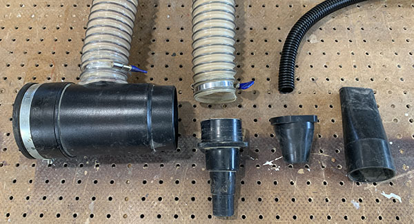 A variety of adaptors for connecting power tools to a dust collection system