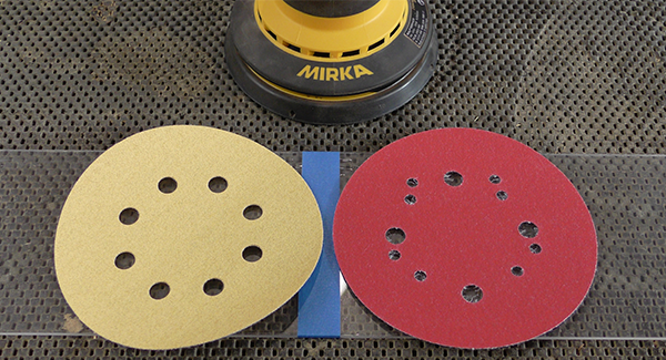 A Mirka Gold sanding disc side-by-side with a discount sanding disc