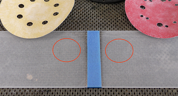 A comparison of the sanding quality of a Mirka Gold sanding disc versus a discount sanding disc 