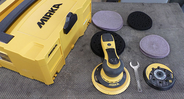 A Mirka Deros 6 inch sander with a 5 inch pad in the travel kit